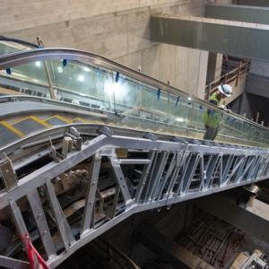 Working on escalator in Rose Pak Chinatown Station