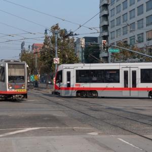 photo of two KT Ingleside-Third trains at 4th and King streets