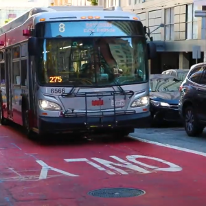 8 Bayshore bus driving in a red transit only lane