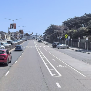 Image of Sloat Boulevard at 47th Avenue looking east with people driving and walking