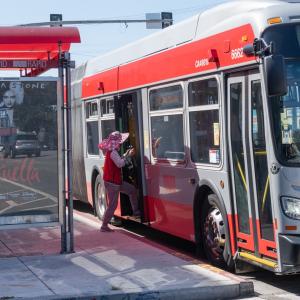 Passenger boarding a bus on Bayshore