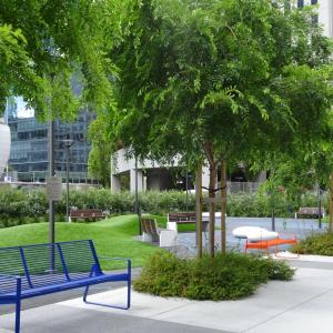 Recent trees and seating along Urban Park at the intersection of  Main and Howard streets