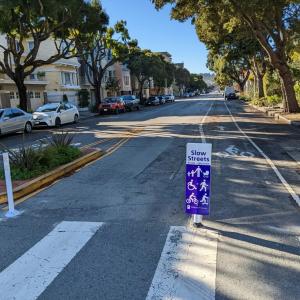 a slow streets program sign on lake street