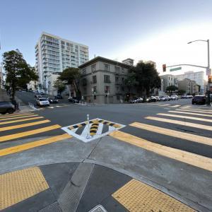 yellow crosswalks and raised mountable curbs on the corner at franklin street 