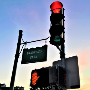 Traffic signals in front of Francisco Park