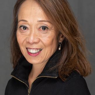 Portrait of Public Outreach and Engagement Manager Lulu Feliciano