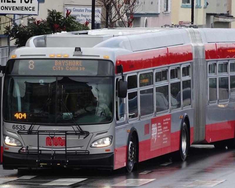 An 8 Bayshore Muni bus traveling on San Bruno Avenue.
